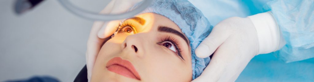 A Girls Picture having Laser Eye Surgery | Doctor Holding Girl Head